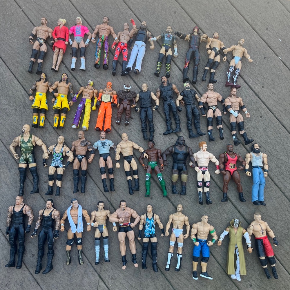 Wwe Action Figure lot, buy each one separate of your choosing. Each is $9.